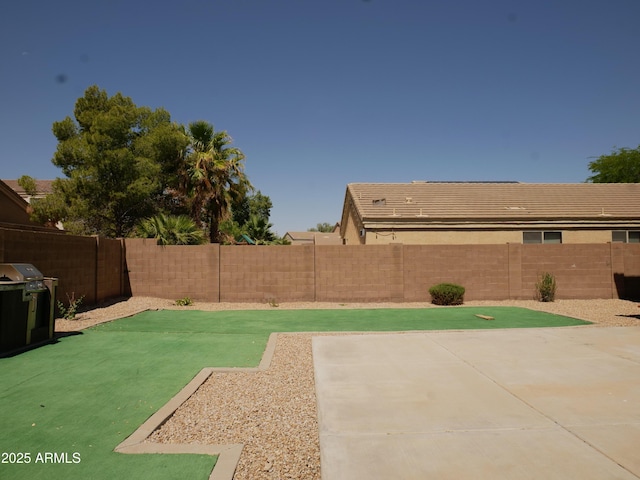 43241 W Kristal Ln, Maricopa, AZ 85138 - fenced backyard featuring a patio area