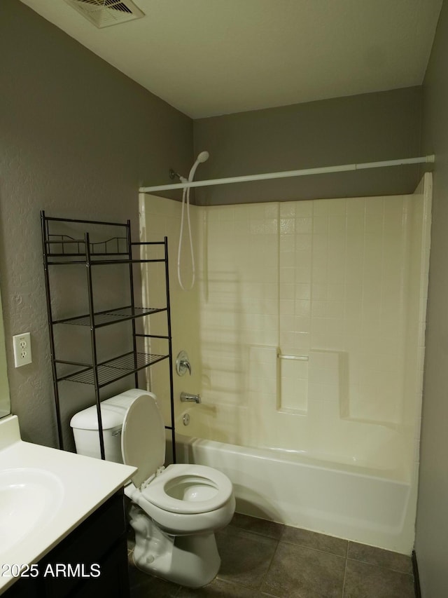 43241 W Kristal Ln, Maricopa, AZ 85138 - bathroom with vanity,  shower combination, toilet, a textured wall, and tile patterned floors