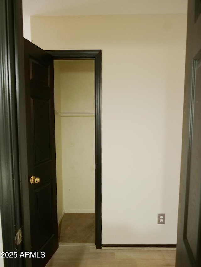 43241 W Kristal Ln, Maricopa, AZ 85138 - unfurnished bedroom featuring light wood-style floors and baseboards