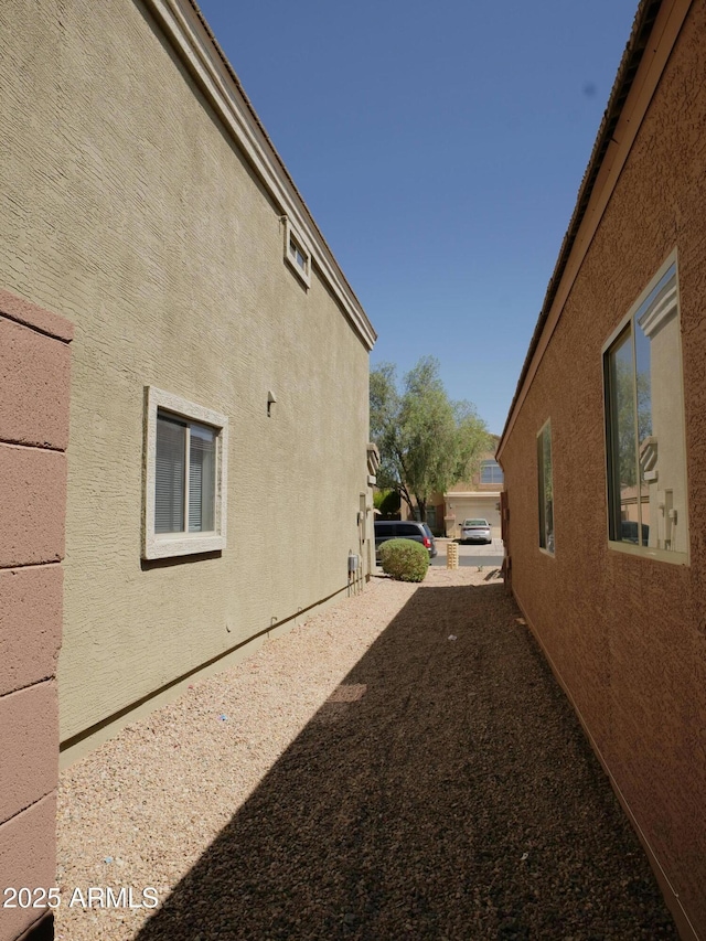 43241 W Kristal Ln, Maricopa, AZ 85138 - view of side of home with stucco siding