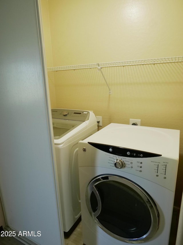 43241 W Kristal Ln, Maricopa, AZ 85138 - washroom with washer and dryer