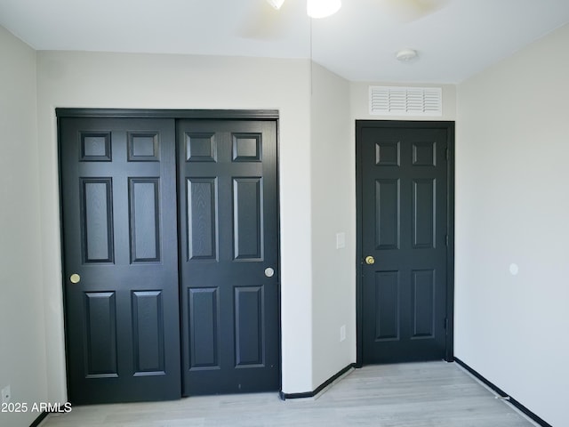 43241 W Kristal Ln, Maricopa, AZ 85138 - entryway featuring a ceiling fan, light wood-style floors, and baseboards