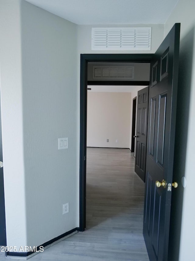 43241 W Kristal Ln, Maricopa, AZ 85138 - hall featuring wood finished floors