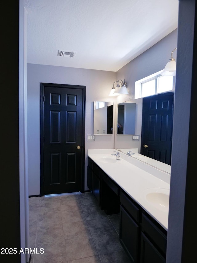 43241 W Kristal Ln, Maricopa, AZ 85138 - bathroom with double vanity and tile patterned floors