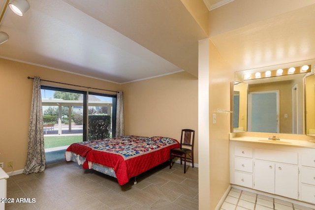 tiled bedroom featuring ornamental molding and sink