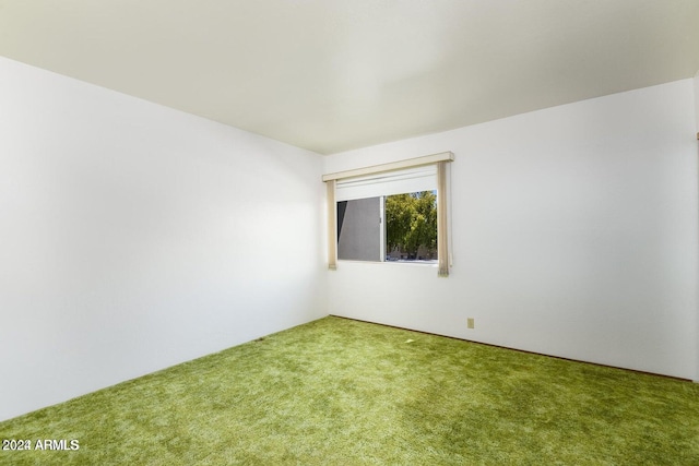 empty room with carpet flooring