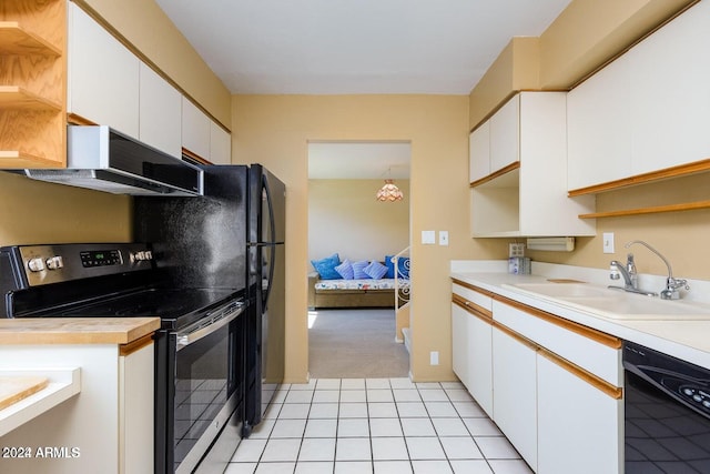 kitchen featuring sink, dishwasher, white cabinetry, stainless steel electric range, and light tile patterned floors