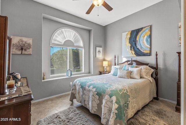 bedroom featuring light tile patterned flooring, a ceiling fan, and baseboards