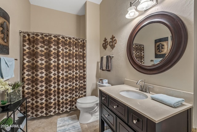 full bath with vanity and toilet