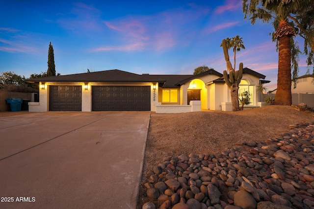 view of front of home with a garage