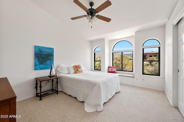 128 N French Dr, Prescott, AZ 86303 - carpeted bedroom featuring baseboards, a ceiling fan, and lofted ceiling