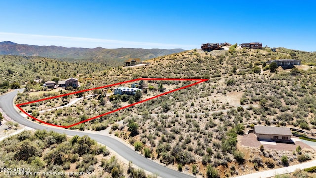 128 N French Dr, Prescott, AZ 86303 - aerial view of property's location featuring a mountainous background and property boundaries highlighted