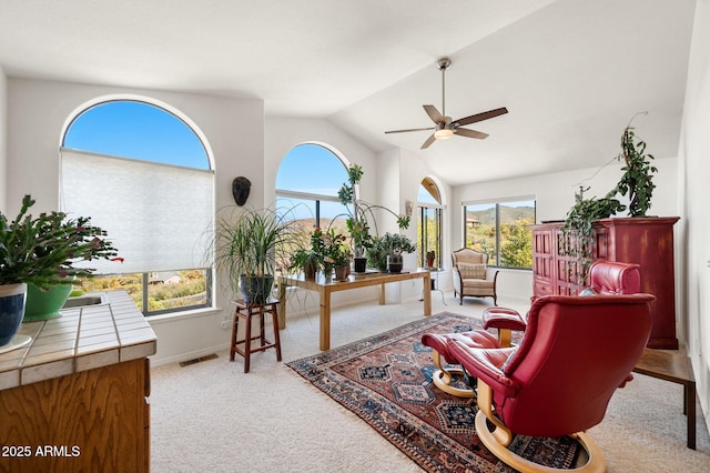 128 N French Dr, Prescott, AZ 86303 - sitting room featuring a ceiling fan, healthy amount of natural light, carpet flooring, lofted ceiling, and baseboards