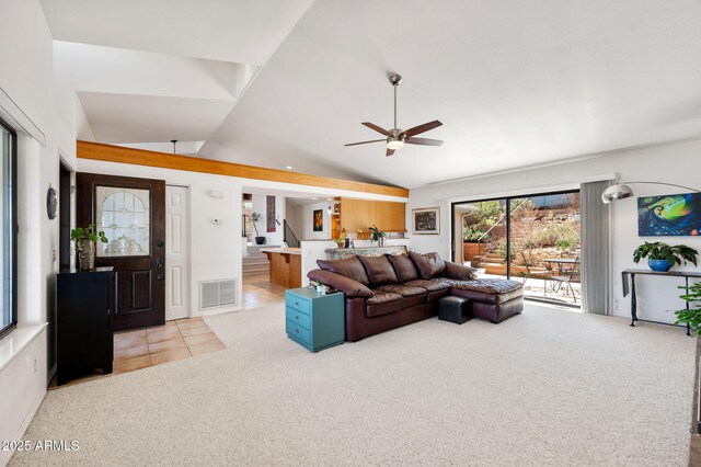 128 N French Dr, Prescott, AZ 86303 - carpeted living area with lofted ceiling, a ceiling fan, and tile patterned flooring