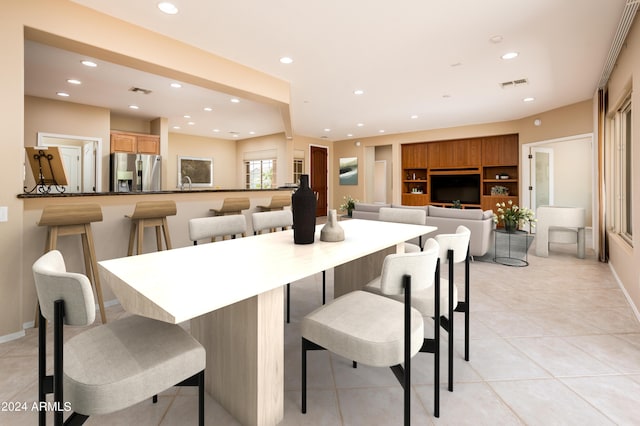 tiled dining space featuring built in shelves