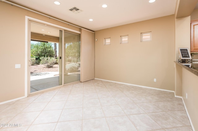 view of tiled spare room