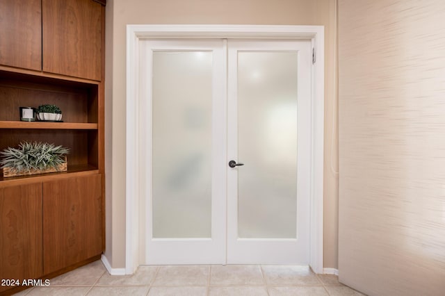 interior space with light tile patterned floors