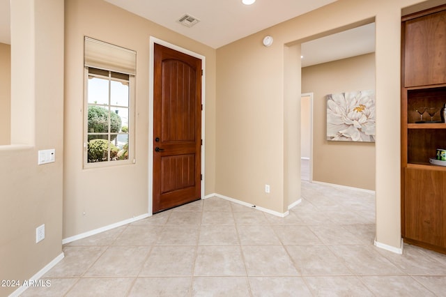 entrance foyer featuring light tile patterned floors