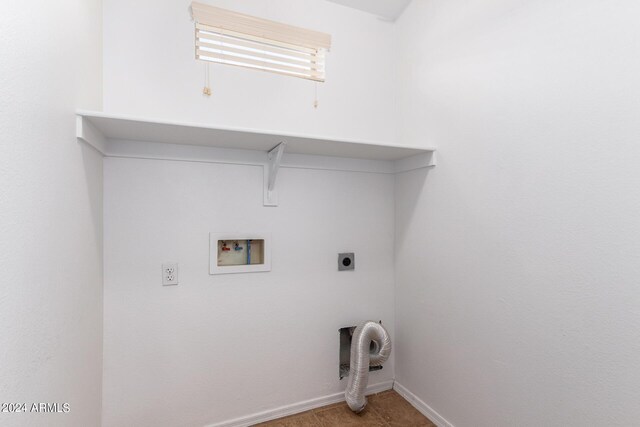 clothes washing area featuring washer hookup, baseboards, laundry area, and hookup for an electric dryer
