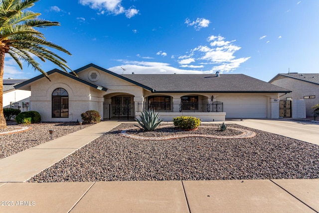 ranch-style home with a garage