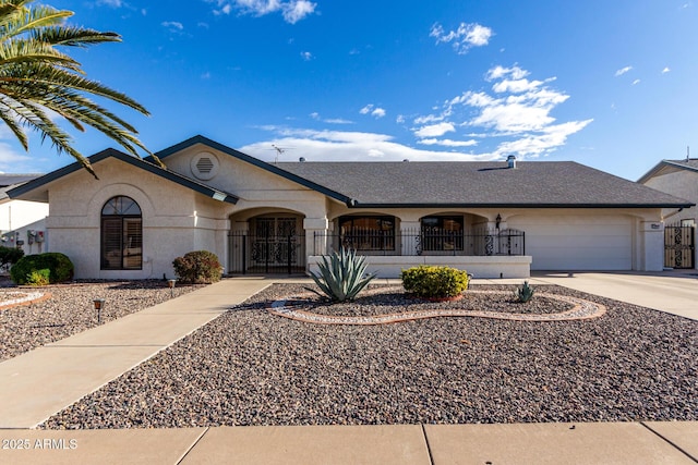 ranch-style home with a garage