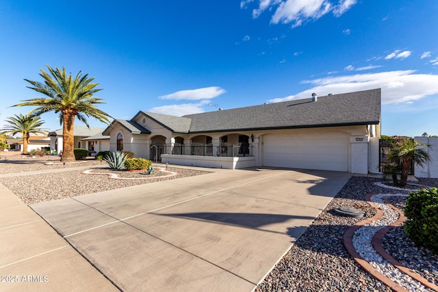 ranch-style house featuring a garage