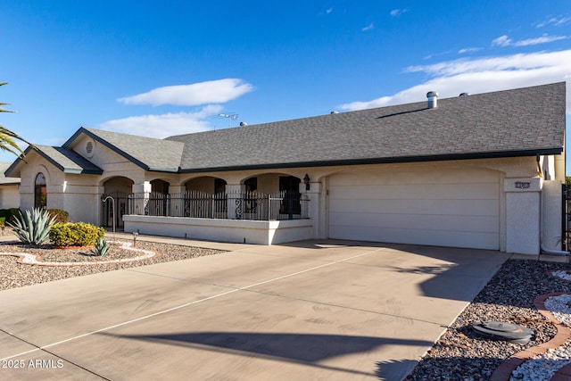 ranch-style house featuring a garage