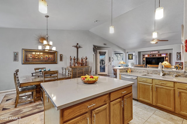 kitchen with ceiling fan, a center island, hanging light fixtures, stainless steel dishwasher, and vaulted ceiling