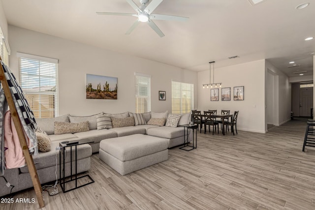 2716 S Chatsworth, Mesa, AZ 85209 - living area featuring a ceiling fan, plenty of natural light, light wood finished floors, recessed lighting, and a chandelier