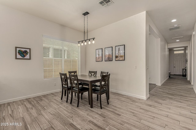 2716 S Chatsworth, Mesa, AZ 85209 - dining space with light wood-type flooring and a chandelier