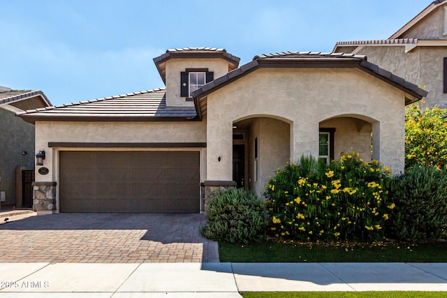 2716 S Chatsworth, Mesa, AZ 85209 - view of front of home with a garage, decorative driveway, stucco siding, and a tile roof