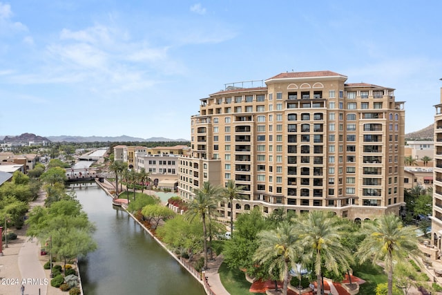 view of building exterior featuring a water view