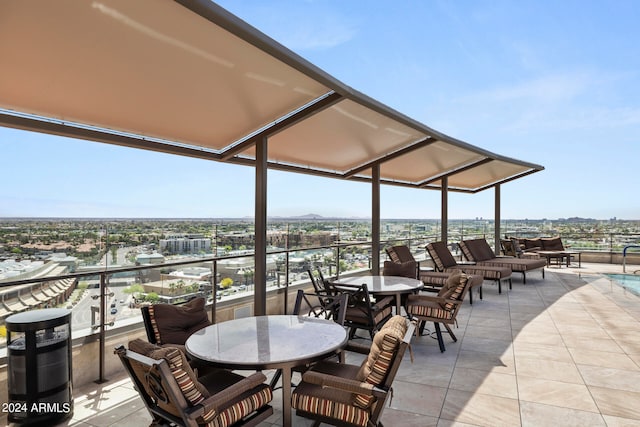 view of patio / terrace featuring a balcony