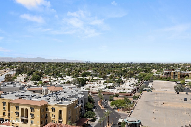 birds eye view of property featuring a mountain view