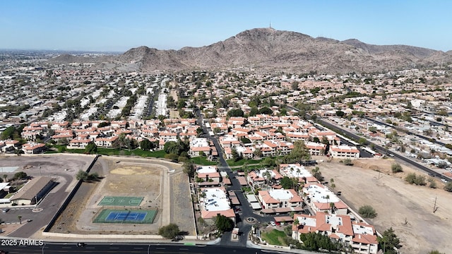 drone / aerial view featuring a mountain view and a residential view