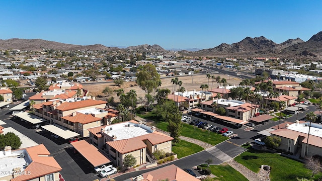 aerial view with a mountain view and a residential view