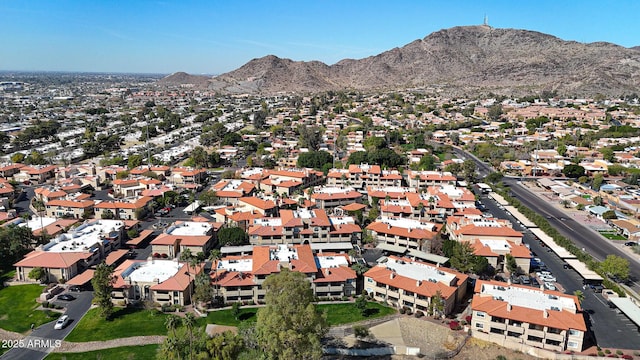 bird's eye view featuring a mountain view and a residential view