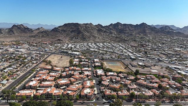 birds eye view of property featuring a mountain view and a residential view