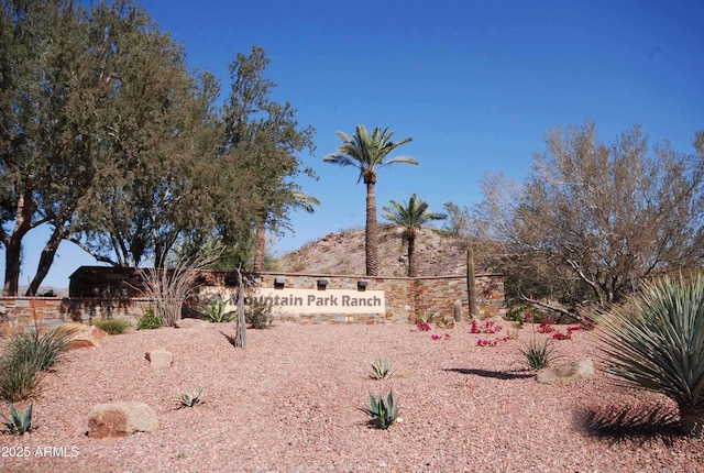 community sign featuring a mountain view