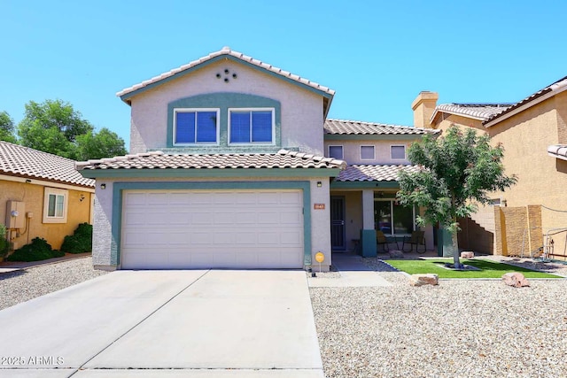 1640 W Gail Dr, Chandler, AZ 85224 - mediterranean / spanish-style home featuring a garage, stucco siding, driveway, and a tile roof
