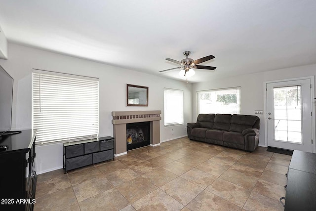 1640 W Gail Dr, Chandler, AZ 85224 - living area with a ceiling fan, a fireplace, and baseboards