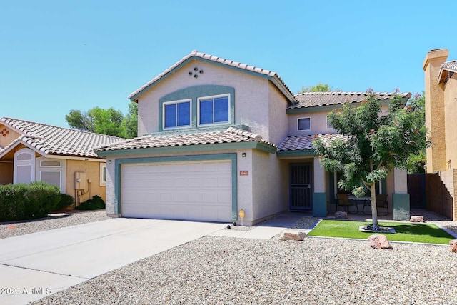 1640 W Gail Dr, Chandler, AZ 85224 - mediterranean / spanish-style house with an attached garage, stucco siding, a tile roof, and driveway