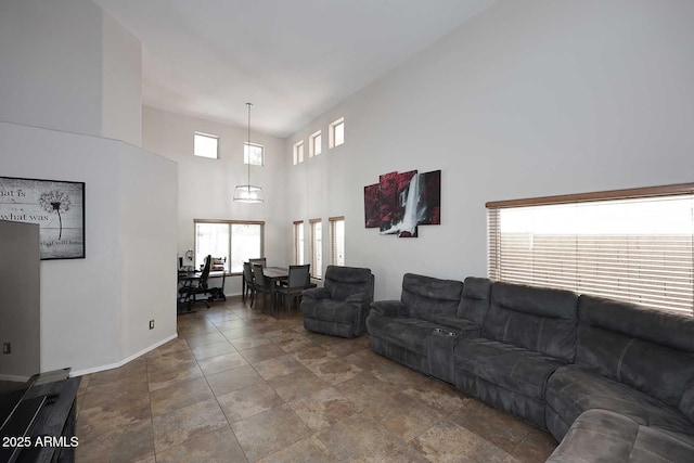 1640 W Gail Dr, Chandler, AZ 85224 - living room with a towering ceiling, stone finish floors, and baseboards