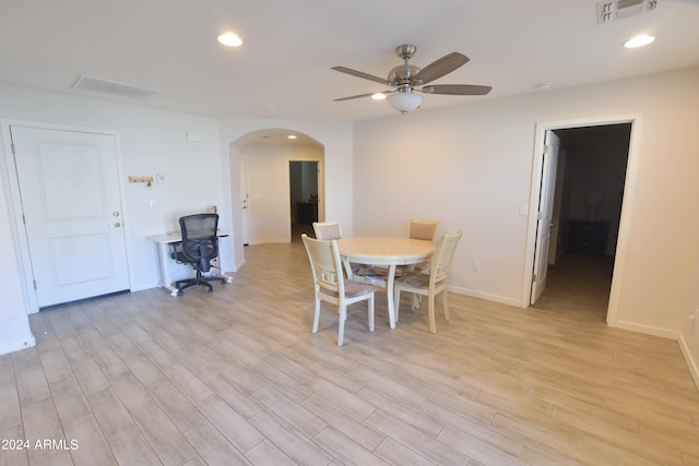 dining area featuring ceiling fan and light hardwood / wood-style flooring