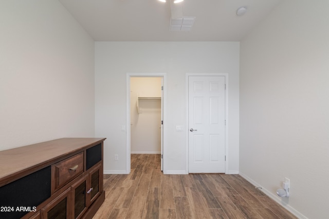 unfurnished room with light hardwood / wood-style floors