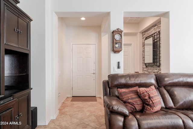 living room with light tile patterned floors