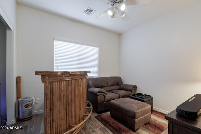 living room with ceiling fan