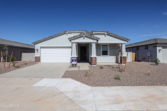 view of front of property featuring a garage