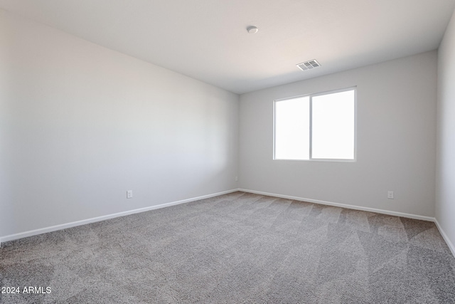 empty room featuring carpet floors