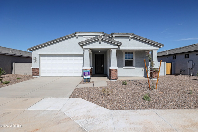 craftsman house featuring a garage